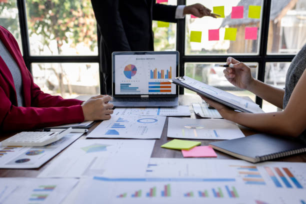 istock Team Of Business working at the office with documents on desk, planning analyzing the financial report, business plan investment, Consultant, finance analysis concept 1868740952