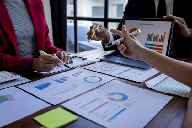 istock Team Of Business working at the office with documents on desk, planning analyzing the financial report, business plan investment, Consultant, finance analysis concept 1868741484