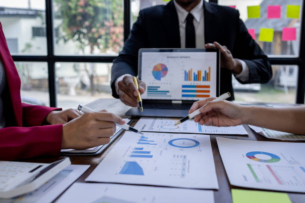 istock Team Of Business working at the office with documents on desk, planning analyzing the financial report, business plan investment, Consultant, finance analysis concept 1868741491