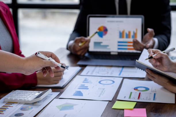 istock Team Of Business working at the office with documents on desk, planning analyzing the financial report, business plan investment, Consultant, finance analysis concept 1868741500
