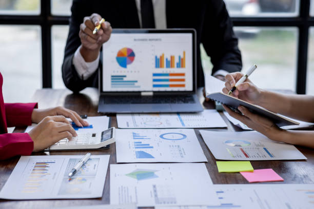 istock Team Of Business working at the office with documents on desk, planning analyzing the financial report, business plan investment, Consultant, finance analysis concept 1868741504