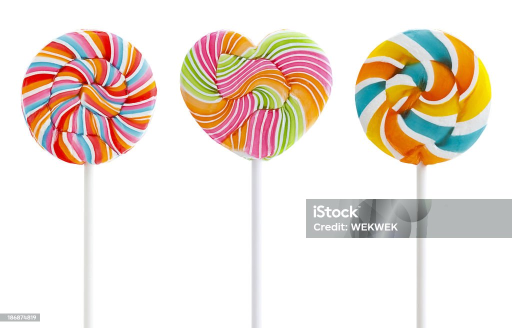 Три красочные Закрученный Lollipops - Стоковые фото Конфета роялти-фри