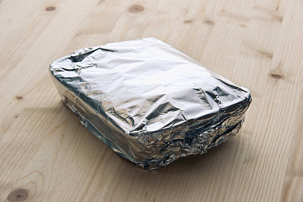 Tray With Aluminum Foil stock photo