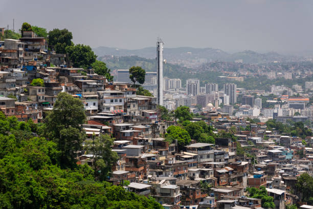 istock Poor residential housing in favela on rainforest hillside in Rio 1868759119