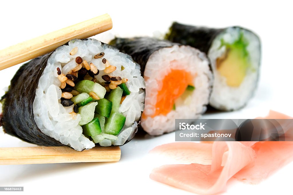 Close-up of several rolls of sushi Traditional japanese sushi isolated on white. Sushi Stock Photo