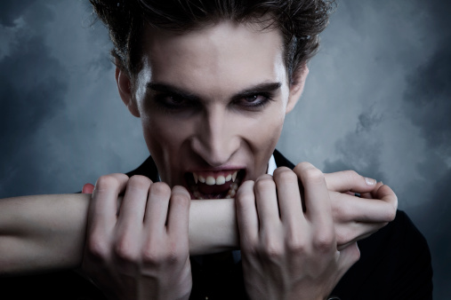 Vampire biting female hand. Halloween theme. 