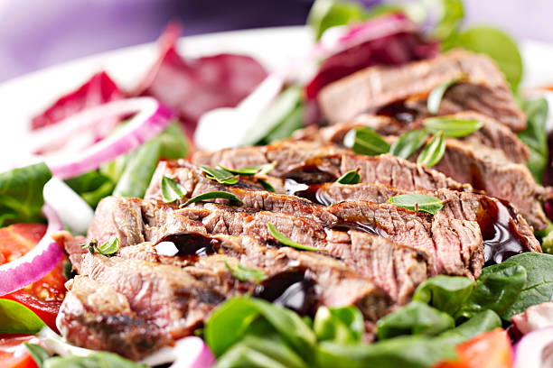 istock Fillet of beef with salad 186877084