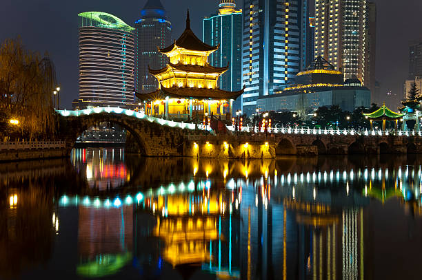 istock Traditional building in front of modern skyscrapers 186877153