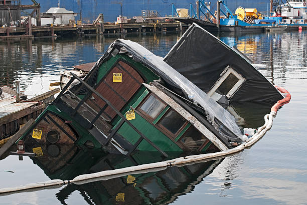 istock Capsized houseboat in lake 186877179