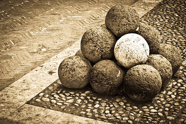 Burghausen, Germany - September 10, 2017: Medieval cannonball pyramid. The image was created on a public street of Burghausen - small medieval town in Germany.