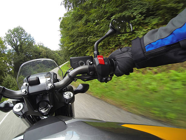 motorcyclist driving - motorcycle motorcycle point of view biker motorcycle racing stock-fotos und bilder