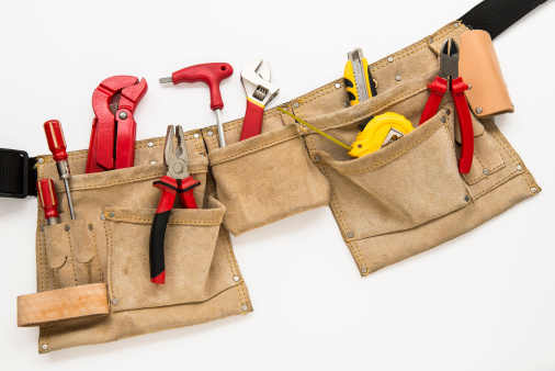 Tool belt with tools on isolated white background
