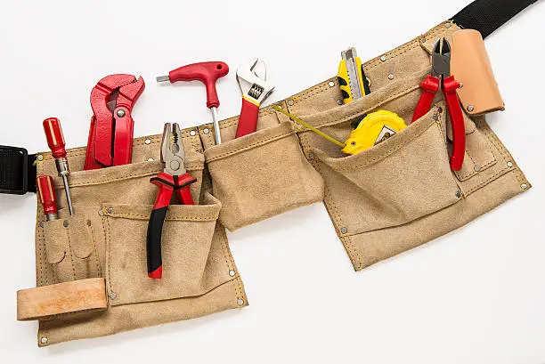 Tool belt with tools on isolated white background