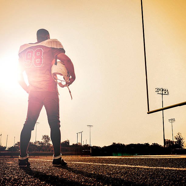 Football player looking at the pitch before the game