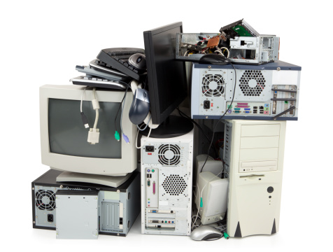 Obsolete computer electronics equipment for recycling, isolated on white.