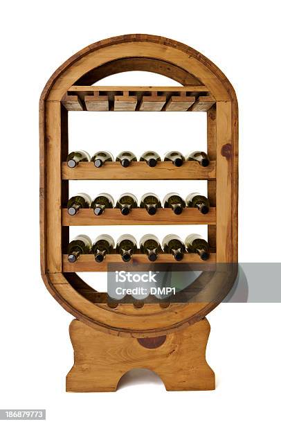 Wine Bottles In Large Freestanding Wooden Rack On White Background Stock Photo - Download Image Now