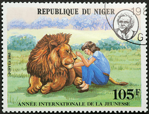 istock woman and lion 186880539