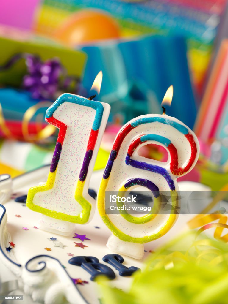Sweet Sixteen Birthday Candle Sweet sixteen birthday candle with differential focus on the gifts.Click on the link below to see more of my party and wedding images Birthday Stock Photo