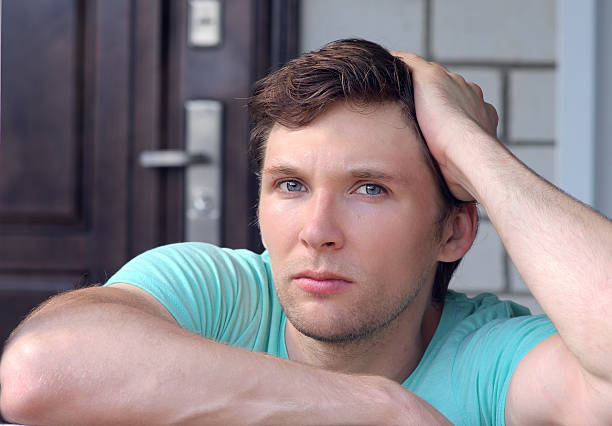 istock Man Portrait Young Handsome looking serious 186881447