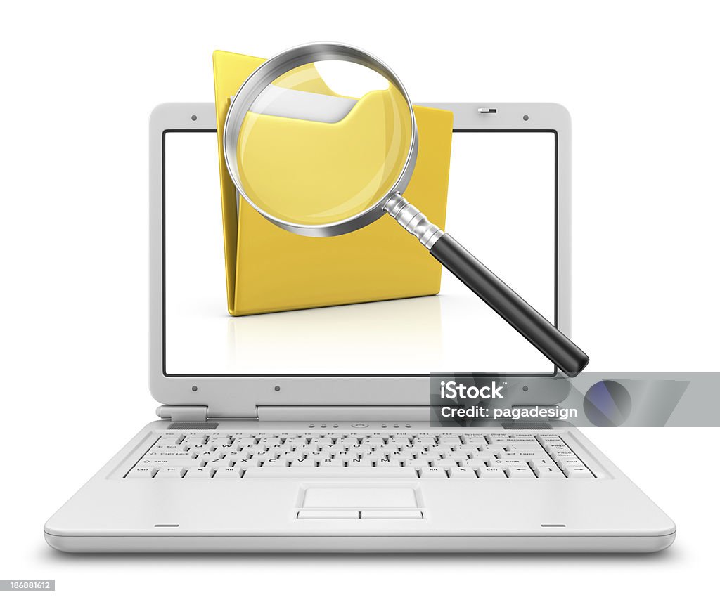 folder and loupe in laptop  Archives Stock Photo