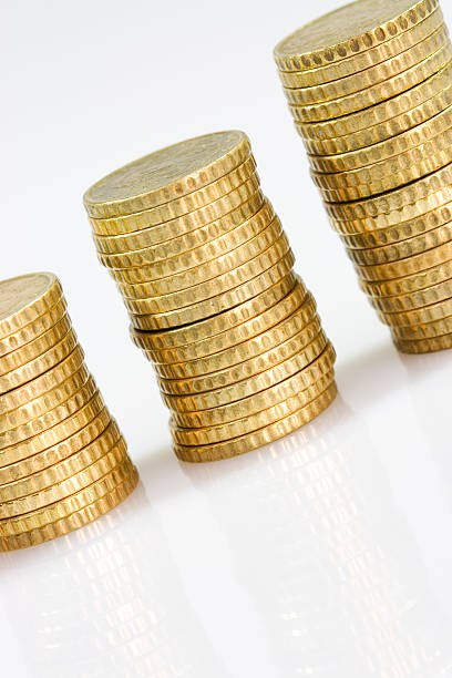 istock raising stacks of coins 186882018
