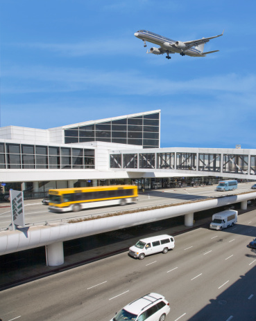 Vienna, Schwechat - January 07, 2023:  Tower and airport buildings of Vienna Airport in Schwechat