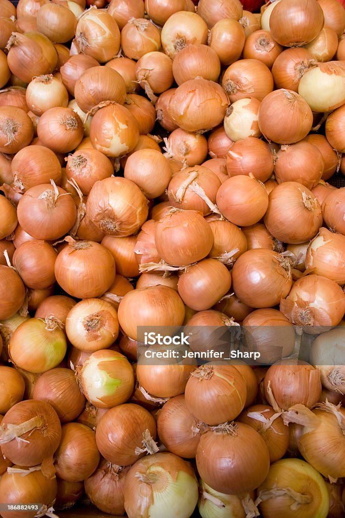 onions stack of oninons at the grocery store Backgrounds Stock Photo