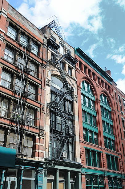 istock NY City buildings with fire escape 186882891