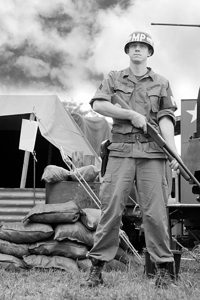 Vietnam era Military Policeman standing guard stock photo