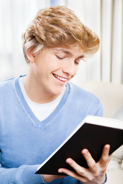 istock Teen enjoying a book 186883846