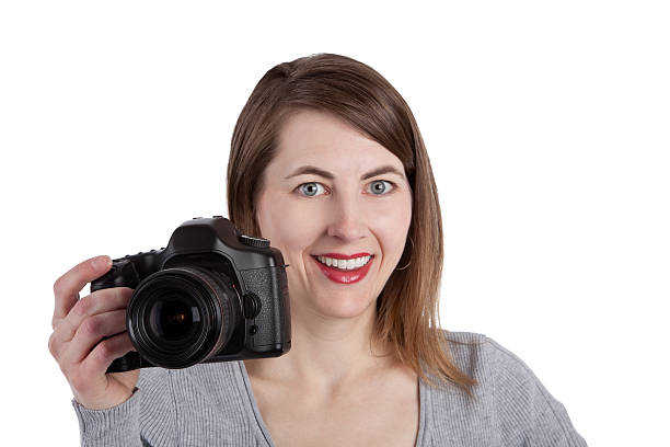 Smiling Photographer With Digital SLR