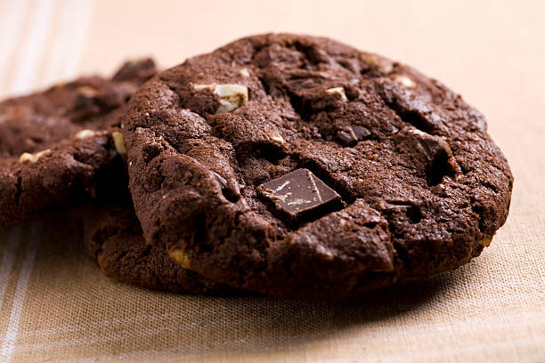 Culinary image of baked triple chocolate cookies  stock photo