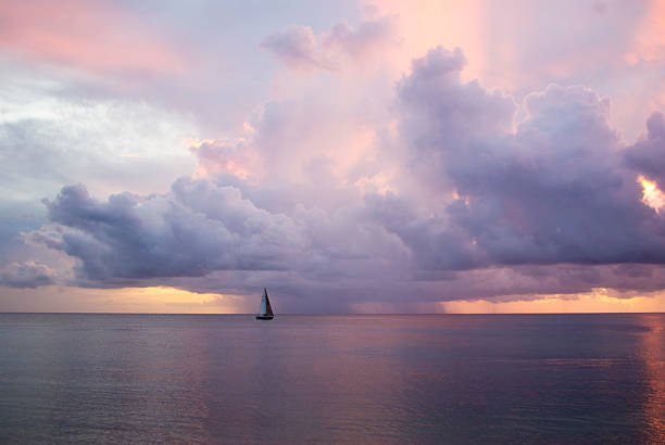 sailing on the serene ocean at sunset