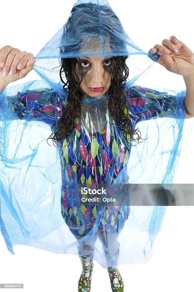 Jovem mulher usando chuva Poncho - Foto de stock de Alagado - Molhado royalty-free