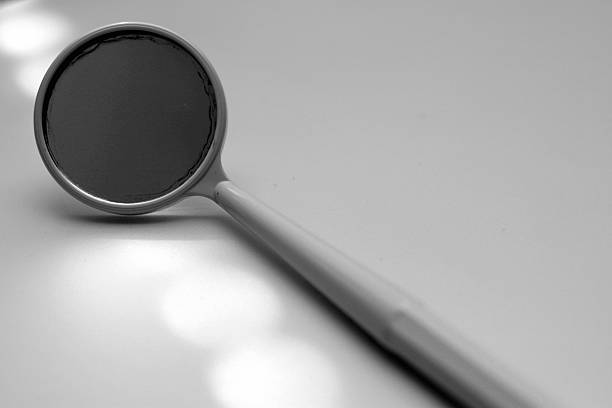 istock a small mirror - dentist dental 186886696