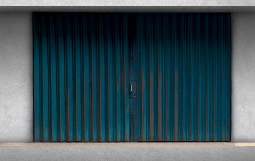Concrete wall with steel shutter door for background