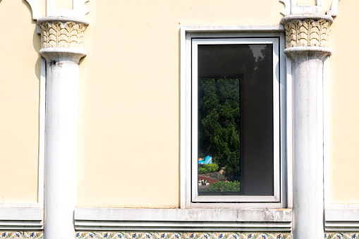 Old window frame with a view of inside the building