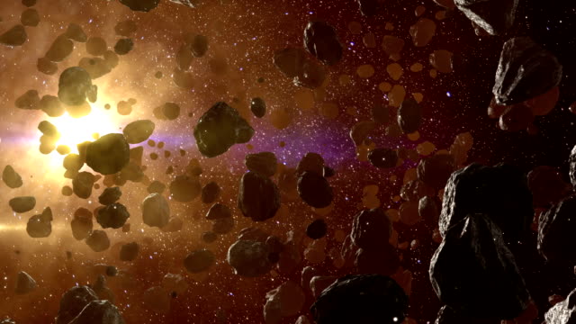 Asteroid field in outer space against sun