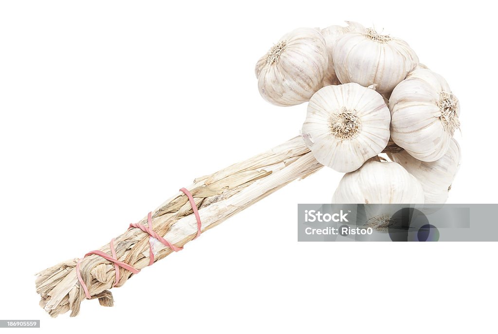 Casco aglio isolato su sfondo bianco - Foto stock royalty-free di Aglio - Alliacee