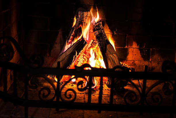 istock Home Fire burning in brick fireplace. Seasonal and 186907468