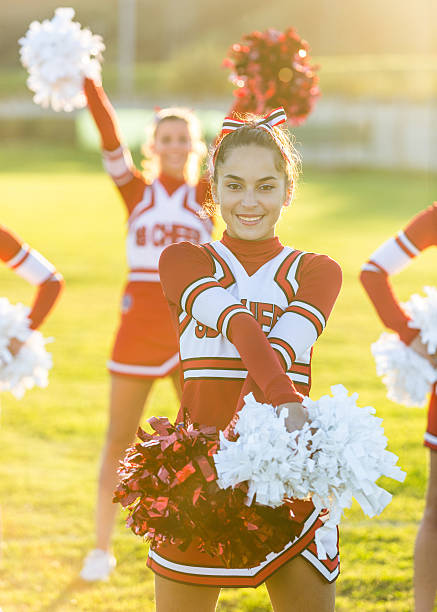 istock Group of Cheerleaders in the Field 186907874