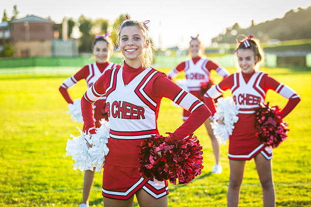 istock Group of Cheerleaders in the Field 186908345