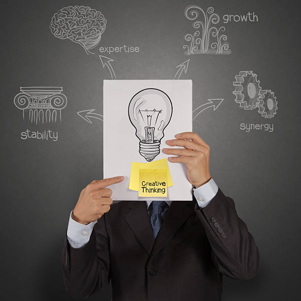 istock businessman hand show book with creative thinking on  sticky not 186908669
