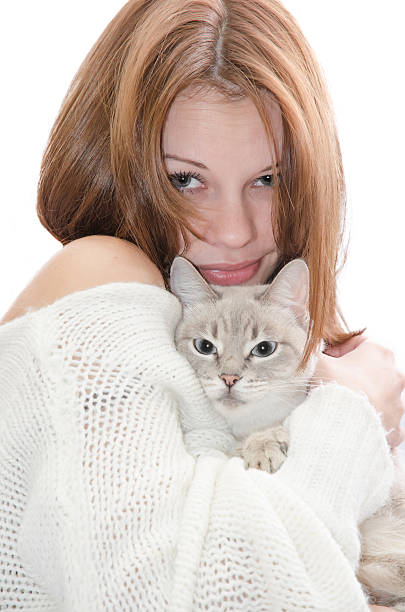 istock Beautiful girl with a cat. 186908717