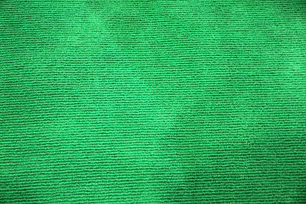 istock Green background from the carpet. 186909513