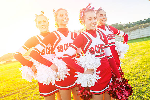 istock Group of Cheerleaders in the Field 186910048