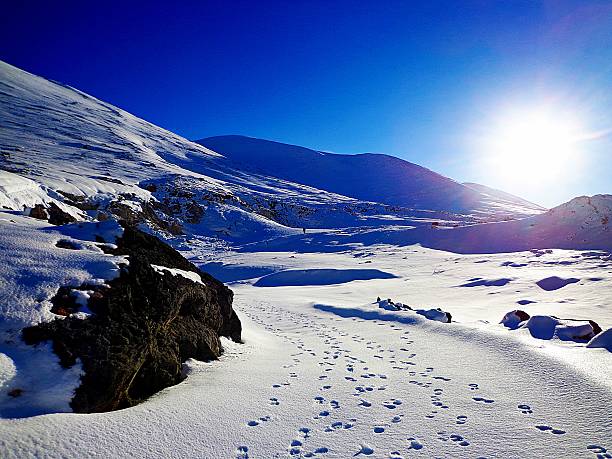 White mountains,Crete,Greece A SUNNY WINTER DAY AND FOOTSTEPS IN THE SNOW IN THE WHITE MOUNTAINS OF CHANIA,CRETE,GREECE lefka ori photos stock pictures, royalty-free photos & images