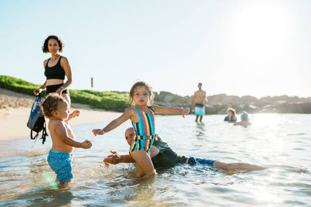 istock Multi-generation family swims in the ocean 1869117345