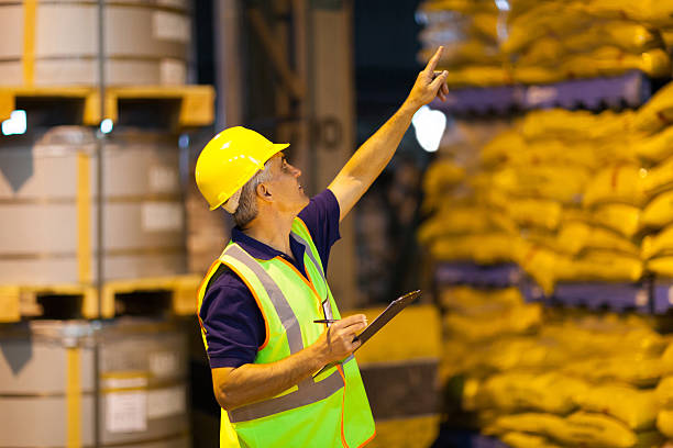 istock shipping company worker counting pallets 186912201
