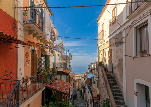 Pizzo, Italy - 13 December, 2023: view of a narrow village street in Pizzo Calabro in typical Italian shabby chic style